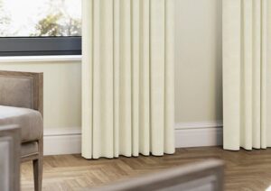 Faux silk blackout curtains in an oyster shade